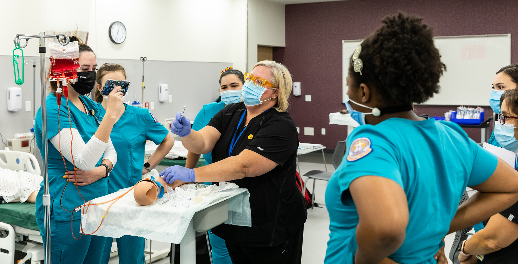 ACC Associate Degree in Nursing (ADN) students and faculty attend a Level 2, IV Therapy Lab inside one of the new state of the art Simulation Labs at the Highland Campus, building 2000